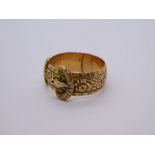 9ct yellow gold buckle ring, with all over floral decoration, size R, 5.5g approx, marked 375