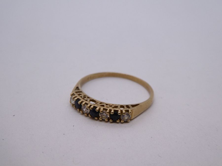 9ct yellow gold ring set with sapphires and cubic zirconia, size P, 1.6g approx. Gold content value