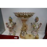 A Pair of Sitzendorf style floral encrusted urns and covers decorated cherubs, one lid restored and