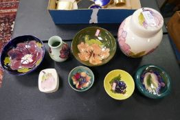 Moorcroft; eight various items including dishes and a ginger jar (8)