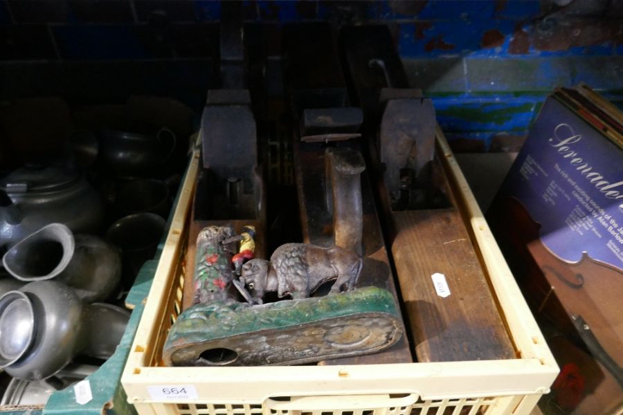 A tray of old moulding planes other planes and a cast iron money box