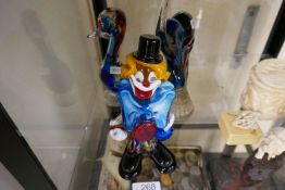 A Murano glass clown and two other Murano glass items