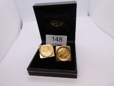 Pair of square 9ct gold mounted cufflinks, each set 1982 half Sovereign, mounts marked 375, London m