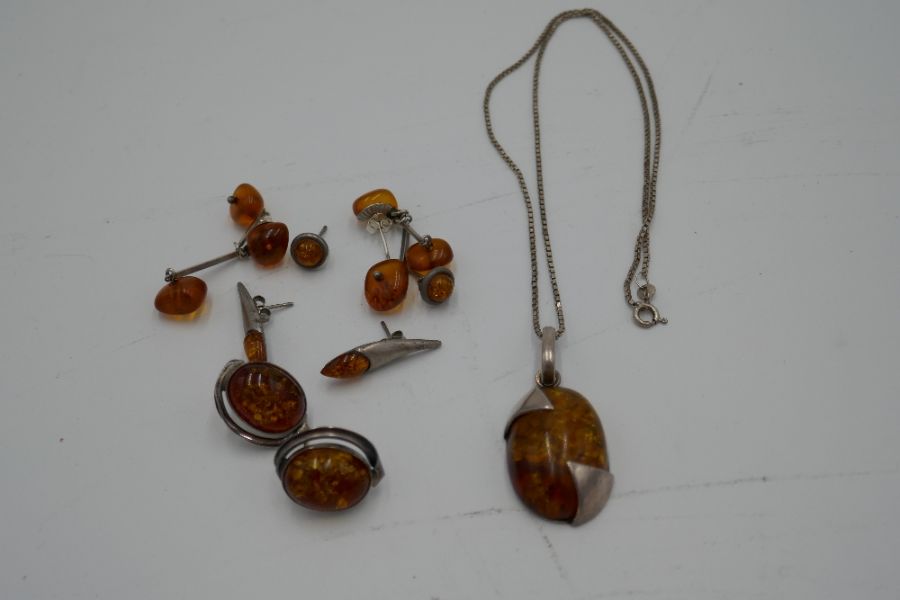 Collection of modern silver and amber jewellery to include necklace, earrings