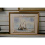 David Eddington, two watercolurs of boats and figures on beach, signed and one other watercolour of