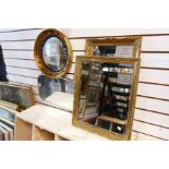 A gilt convex wall mirror and three others