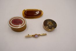 Yellow meal bar brooch set with an opal and clear stones, two pill boxes and a brooch