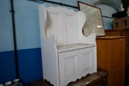 An old painted pine settle