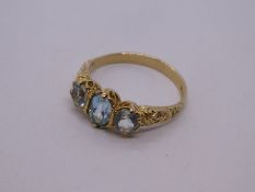 Victorian style aquamarine possibly, trilogy ring mounted floral engraved shoulders, marked 375, Bir