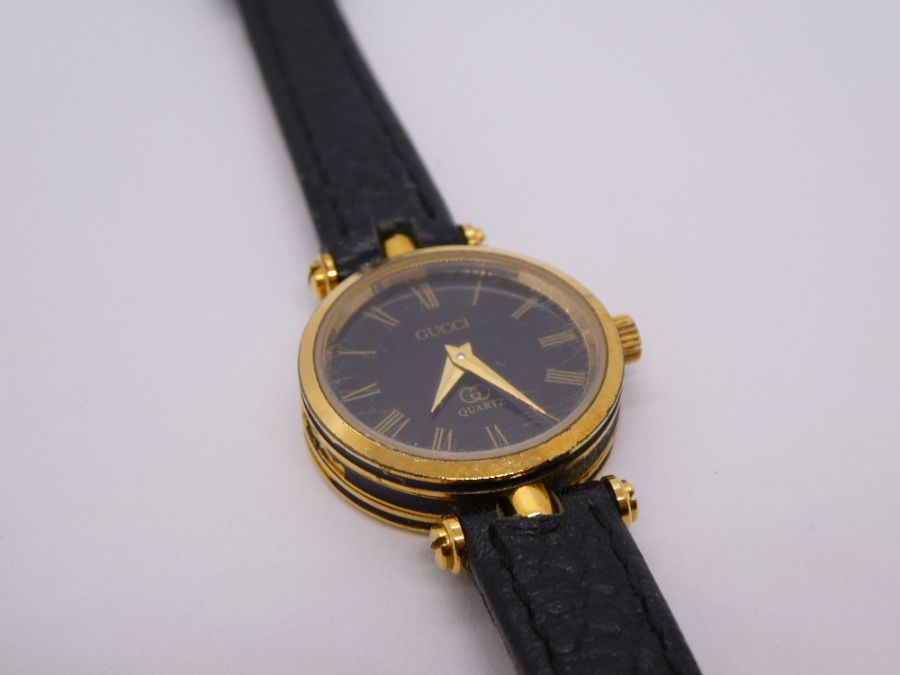 Cased 'Gucci' wristwatch on black leather strap, purchased 1988 - Image 4 of 8