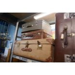 Two old leather suitcases and others