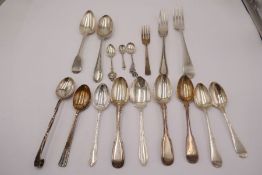 A quantity of mixed silver cutlery comprising of a pair of Georgian teaspoons, other Georgian flatwa