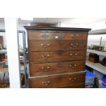 A Georgian mahogany chest on chest having two short and six long drawers on bracket feet, 112cms