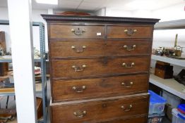 A Georgian mahogany chest on chest having two short and six long drawers on bracket feet, 112cms