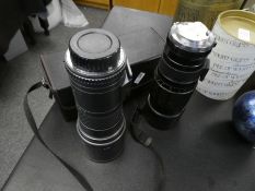 A Sigma telephoto lens, 400mm and one other