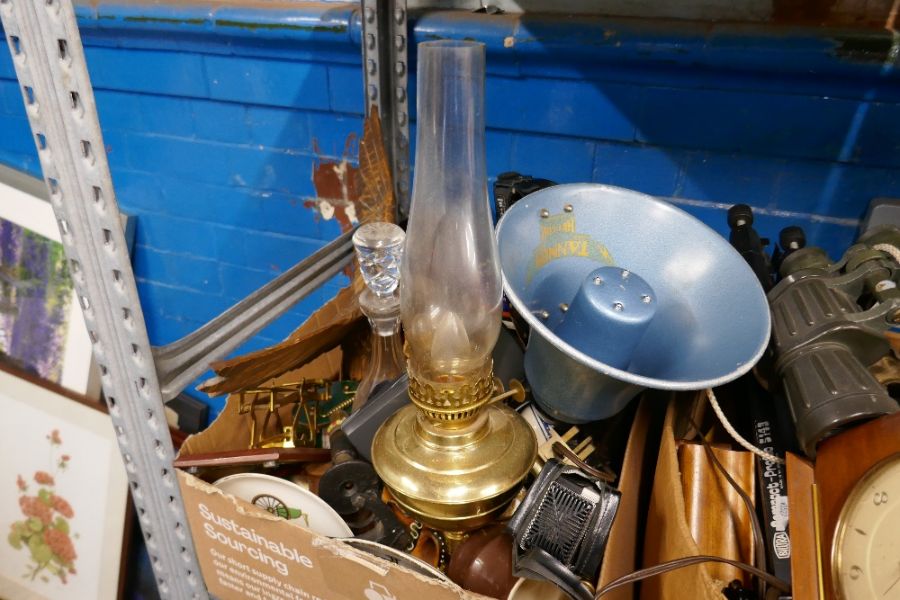 A shelf of old camera equipment, a Tannoy speaker and sundry