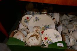 A box of assorted china items