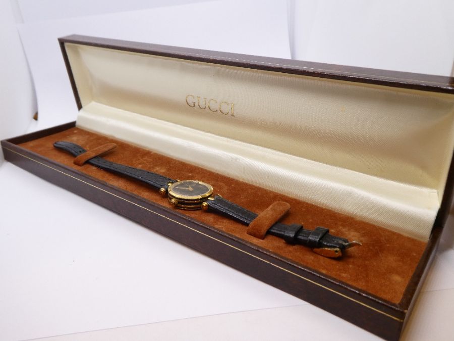 Cased 'Gucci' wristwatch on black leather strap, purchased 1988 - Image 2 of 8