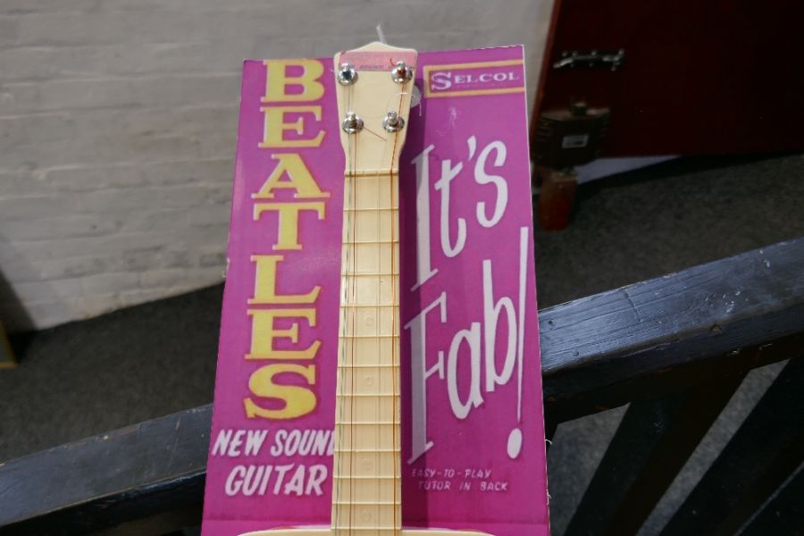 A Selcol Beatles guitar on reproduction cardboard back (guitar length 58cms) - Image 4 of 4