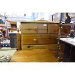 A Ducal style pine chest of drawers, a three drawer beside and a headboard