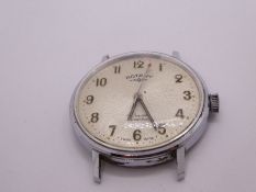 A vintage stainless steel Rotary watch, with a silver dial, winds and ticks