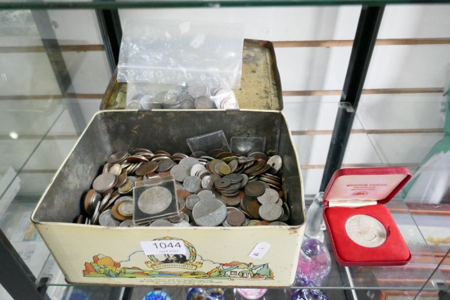 A tin of mixed coinage