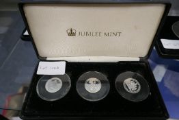 Four sets of Jubilee Mint coins, mostly silver proof and one other silver triple thickness £5 coin