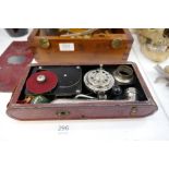 A Thorens Excelda pocket camera gramophone in red metal case, circa 1920s/1930s