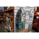 Tall outdoor arched mirror