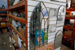 Tall outdoor arched mirror