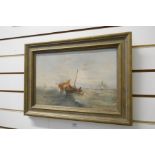 An old oil of fisherman pulling pots, unsigned, relined