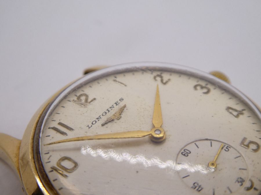 A 9ct gold gents LONGINES watch, probably dating from 1950/1960 of large size, winds and ticks - Image 7 of 7