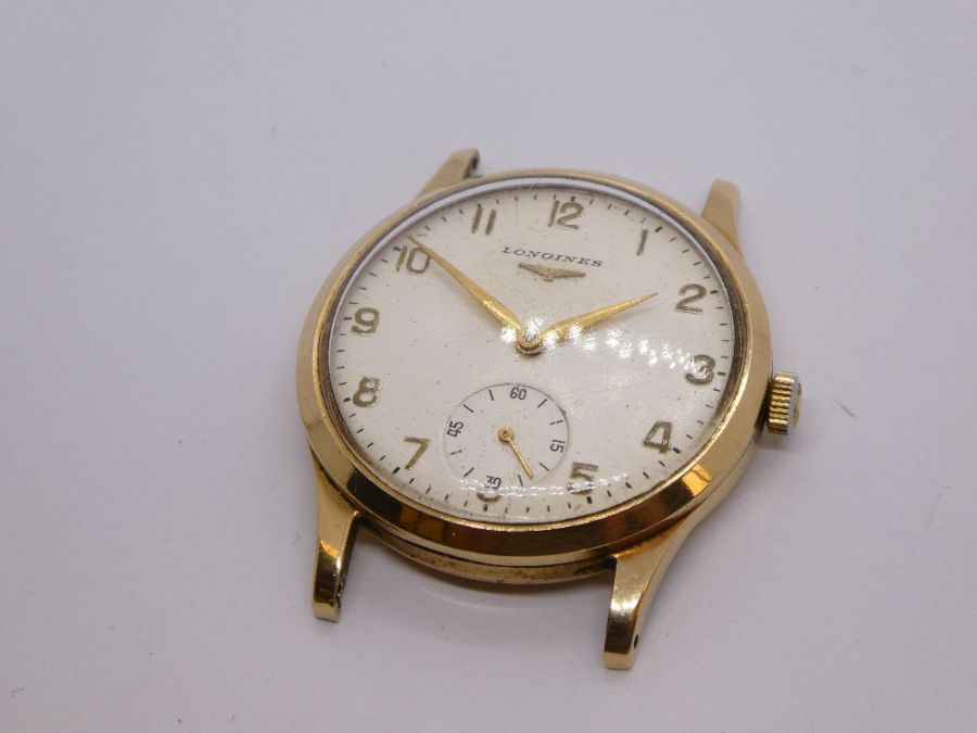 A 9ct gold gents LONGINES watch, probably dating from 1950/1960 of large size, winds and ticks