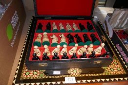 Chess board and cased set of chess men