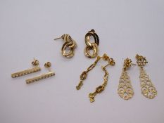 Two pairs of 9ct yellow gold earrings and two pairs of yellow metal examples, 5.7g approx