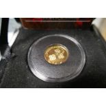 An official "Lest We Forget" gold half sovereign, limited edition of 999, 4 grams