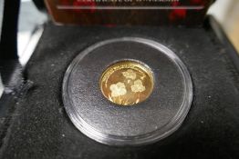 An official "Lest We Forget" gold half sovereign, limited edition of 999, 4 grams