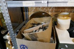 A shelf of sundry including china, glass and cutlery