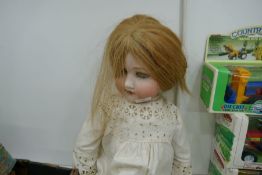 A bisque head doll by Armand Marseille model 390