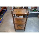 A Victorian inlaid burr walnut whatnot on turned supports