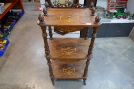 A Victorian inlaid burr walnut whatnot on turned supports