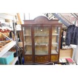 An Edwardian inlaid mahogany display cabinet having central bow fronted door