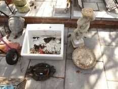 A Victorian cast iron boot scraper a Butler's sink and a figured bird bath