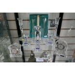 Two small crystal clocks, Edinburgh crystal candlesticks and other glassware