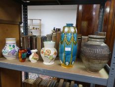 A Minton Secessionist vase (A/F) and other vases, including Moorcroft, Poole, and Clarice Cliff exam