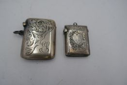 Two very pretty, ornate Vesta cases, one with a central, vacant heart cartouche. This lovely Edwardi