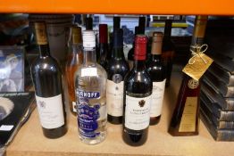 A selection of wines, Smirnoff Vodka, including liqueurs, etc
