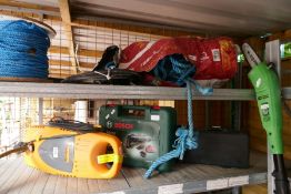 An electric chainsaw pruner, a pressure washer, rope and sundry