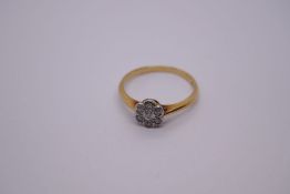 18ct yellow gold diamond cluster ring, central stone approx 0.10 carat, size O, marked 18ct, approx