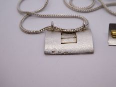 Contemporary silver necklace and earrings set of rectangular form with gold plated detail marked 925